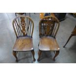 A pair of elm and beech kitchen chairs