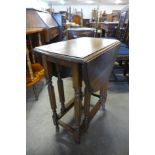 An oak gateleg table