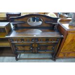 An oak barleytwist mirrorback sideboard