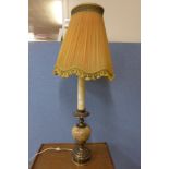A brass and onyx table lamp