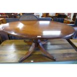 A Bevan & Funnell mahogany oval rise and fall coffee table