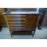 An Edward VII mahogany music cabinet