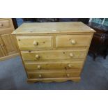 A pine chest of drawers