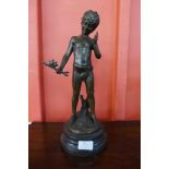A French style bronze figure of a boy and two birds, on black marble socle
