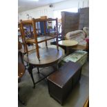 A teak trolley, invalid table, wicker armchair, ottoman and table