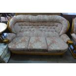 A beech and upholstered two piece suite by Foynson Holland, High Wycombe