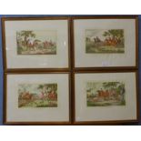 A set of four fox hunting engravings, 21 x 32cms, framed