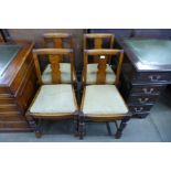 A set of four oak dining chairs