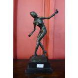 A French style bronze figure of a Jester, on black marble socle