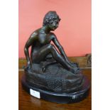 A French style bronze figure of a nude boy and turtle, on black marble plinth