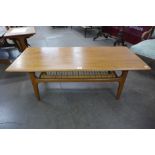 A Danish Trioh teak and rattan coffee table