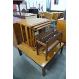 A teak coffee table, nest of tables and a magazine rack