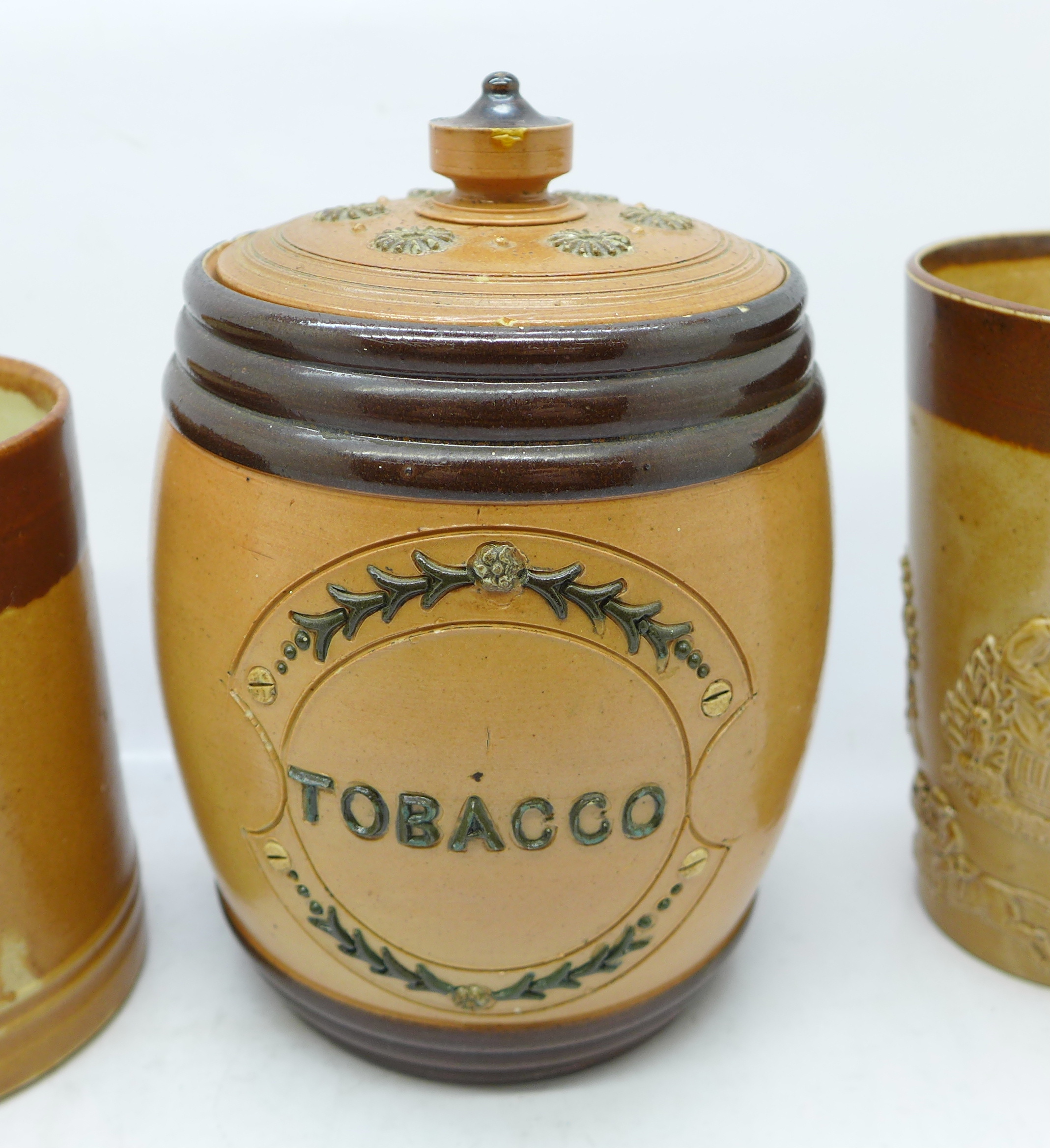 A Doulton Lambeth tobacco jar, two mugs and a beaker, chips on rim of tobacco jar - Image 2 of 4