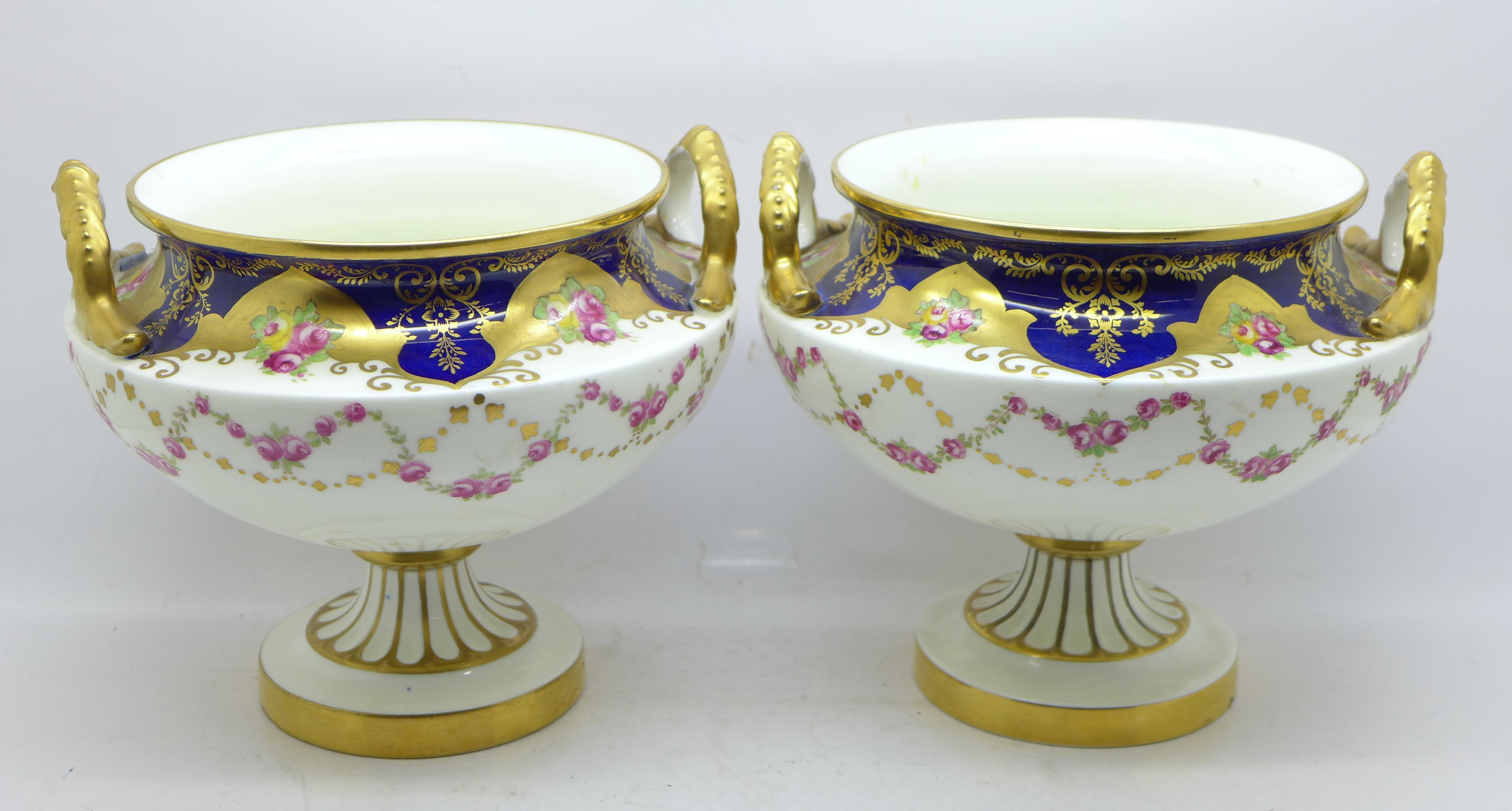 A pair of Cauldon China two handled vases