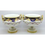 A pair of Cauldon China two handled vases