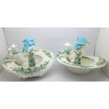 A pair of 19th century porcelain baskets, with a dog and a cat, a/f