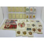 Approximately seventy-five silk cigarette cards