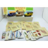 A Co-op limited edition vintage model set, boxed, two cigarette packets with cigarette cards and a