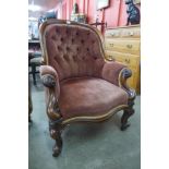 A Victorian mahogany and upholstered button-back library chair