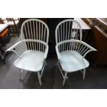 A pair of painted Windsor armchairs