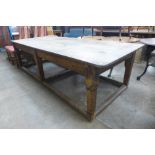 A large oak and pine refectory table