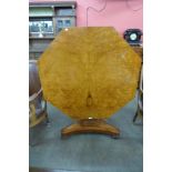 A Victorian thuya wood octagonal tilt top breakfast or centre table