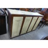 A Victorian painted oak four door locker/cupboard