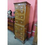 A George I style walnut chest on chest