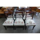 A set of six Regency style mahogany dining chairs