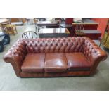 A burgundy leather Chesterfield settee