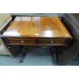 An Regency style inlaid mahogany sofa table