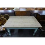 A painted pine scrub top kitchen table