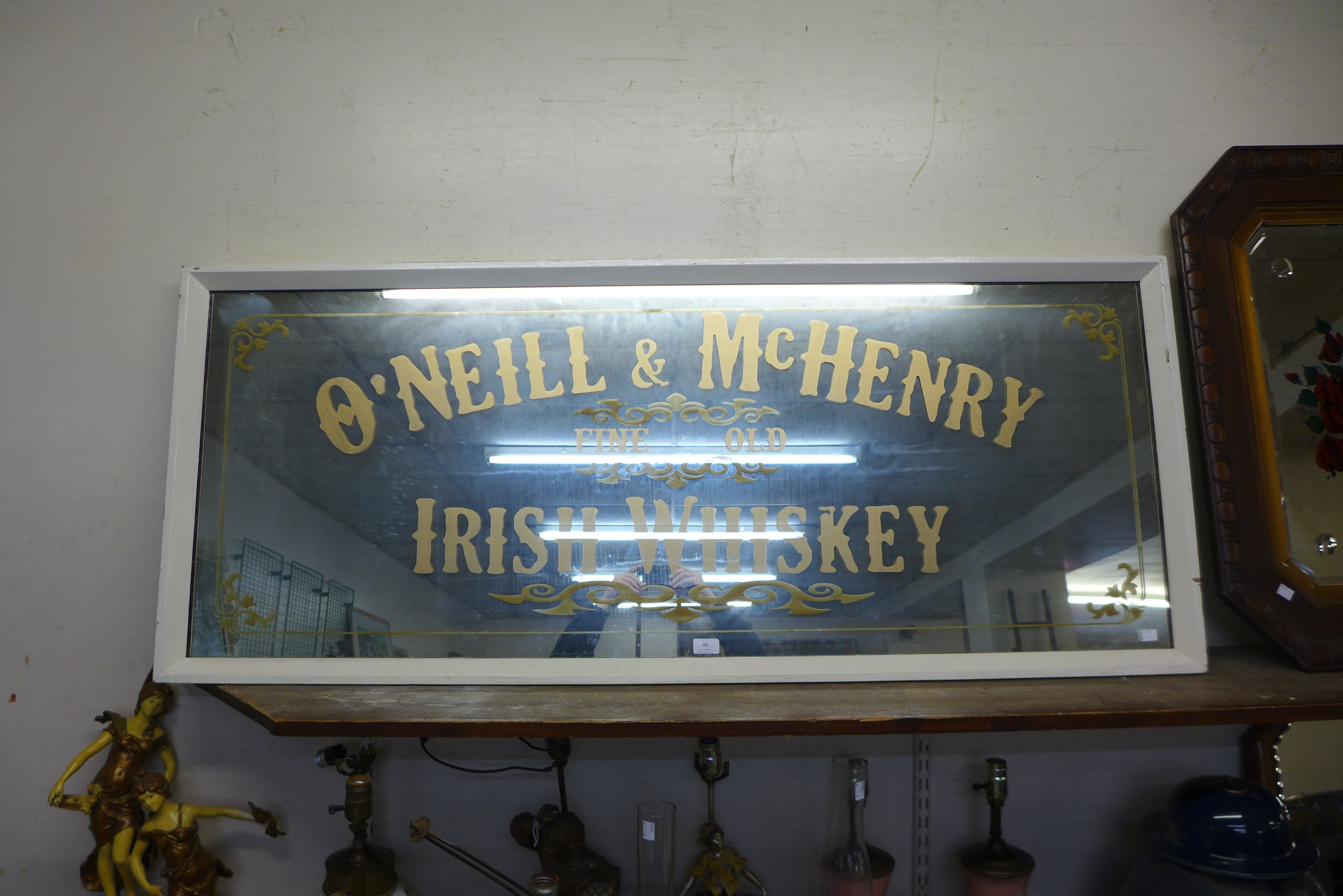 A large advertising mirror, bearing O'Neil & McHenry inscription to glass - Image 2 of 2