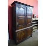 A George III oak housekeeper's cupboard (missing shelves)