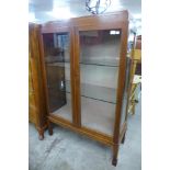 A mahogany display cabinet