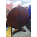 A Victorian mahogany circular tilt top breakfast table