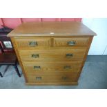 A Victorian pitch pine chest of drawers