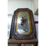An early 20th Century oak framed gypsy mirror