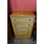 An Arts and Crafts Cotswold School oak chest of drawers