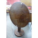 A Victorian mahogany circular tilt top occasional table