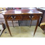 A Victorian style mahogany two drawer side table