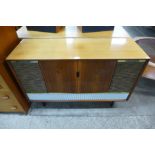 A Decca SRG 707 walnut stereogram with Garrard record player