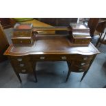 An Edward VII marquetry inlaid mahogany writing desk