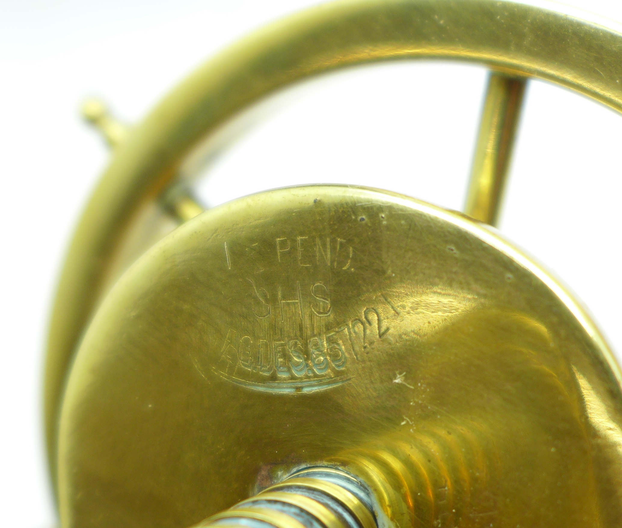 A miniature brass tilt-top table and a brass ship's wheel nut cracker - Image 4 of 5