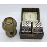 A pair of silver napkin rings, 48g, and a silver and wooden toothpick holder with inscription
