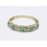 A 9ct gold, emerald and diamond nine stone ring, 1.6g, P