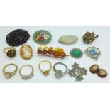 An amber brooch, four rings, etc., (one brooch lacking pin)