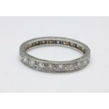 A white metal and diamond eternity ring, 2.8g, O