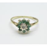 A 9ct gold, emerald and diamond cluster ring, 1.4g, M