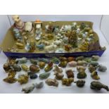 A large collection of Wade Whimsies and similar figures, some a/f